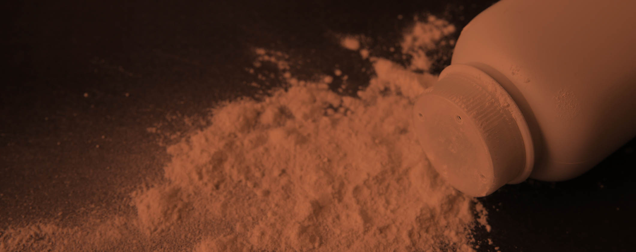Talcum powder on black background